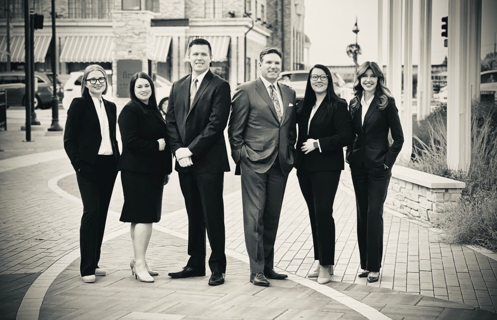 st. charles personal injury lawyers pose for staff photo